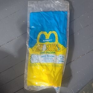 McDonald's Blue and Yellow Dino-Pulsion Bebe Sinclair Happy Meal Toy